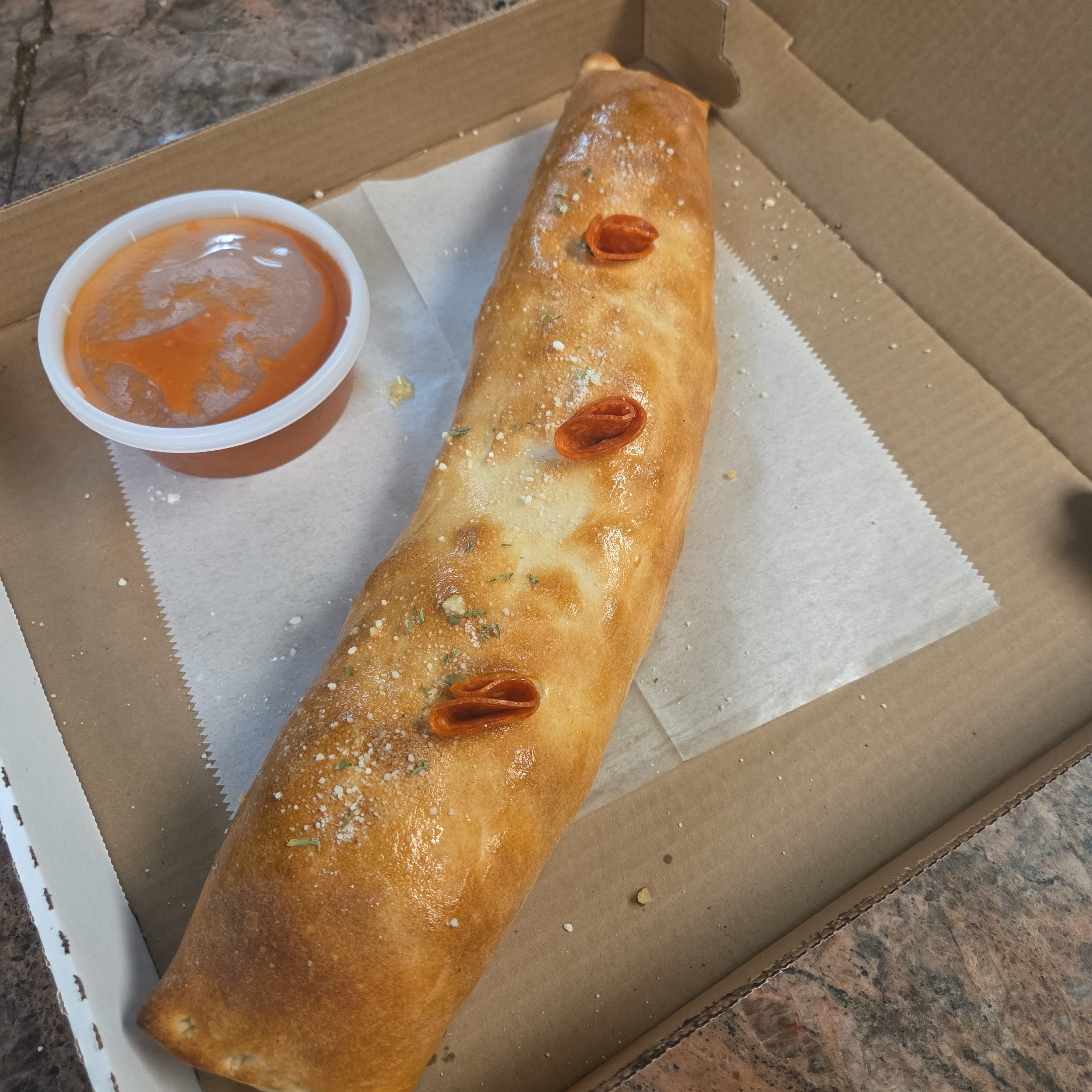 Large Pepperoni & Mozzarella Stromboli.
