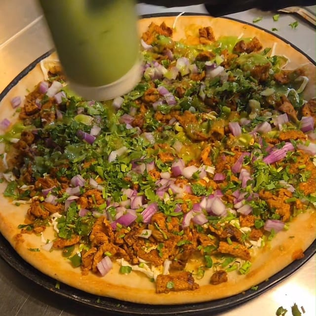 Large Al Pastor Pizza.