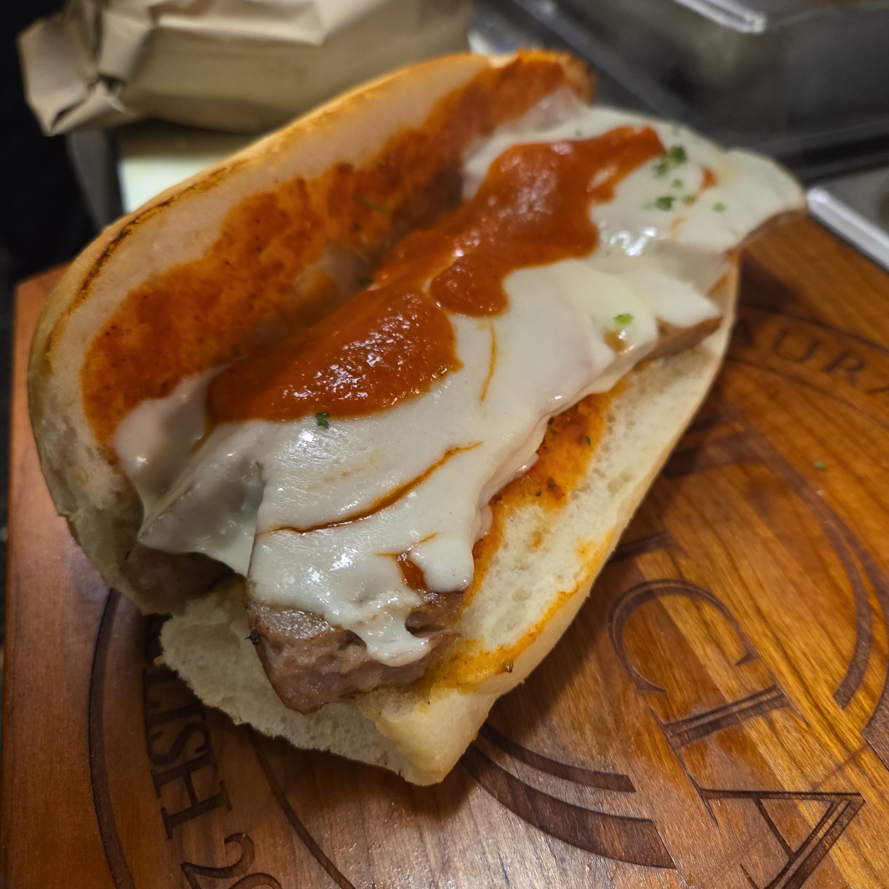Small Sausage Parmigiana Sub.